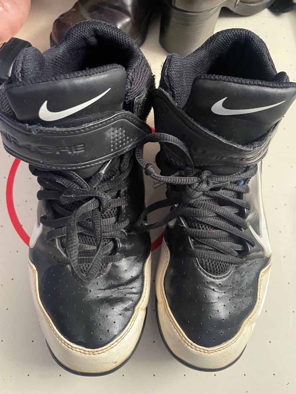 Nike Black Cleats with White Swoosh